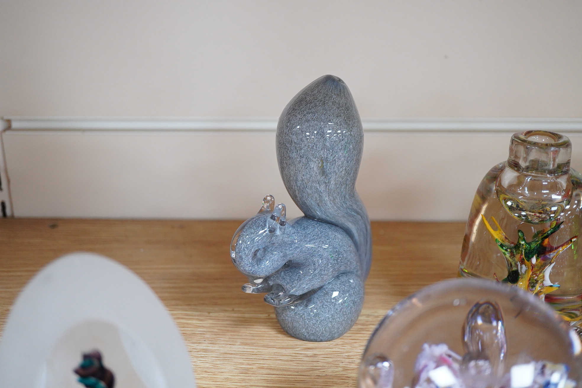 A large collection of 20th century paperweights to include Svaja, Mdina and some novelty examples in the form of animals, largest 27cm high